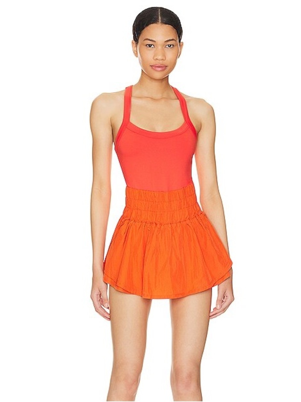 FP Movement One-Piece Cutout romper in Morning Burst Orange Revolve Small S